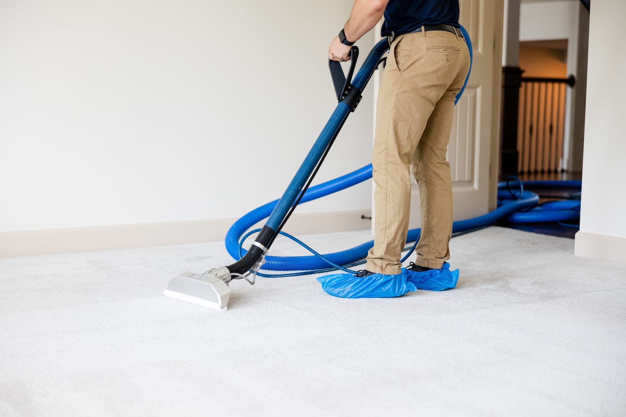 Hot water extraction in progress during a carpet cleaning visit in North Spokane