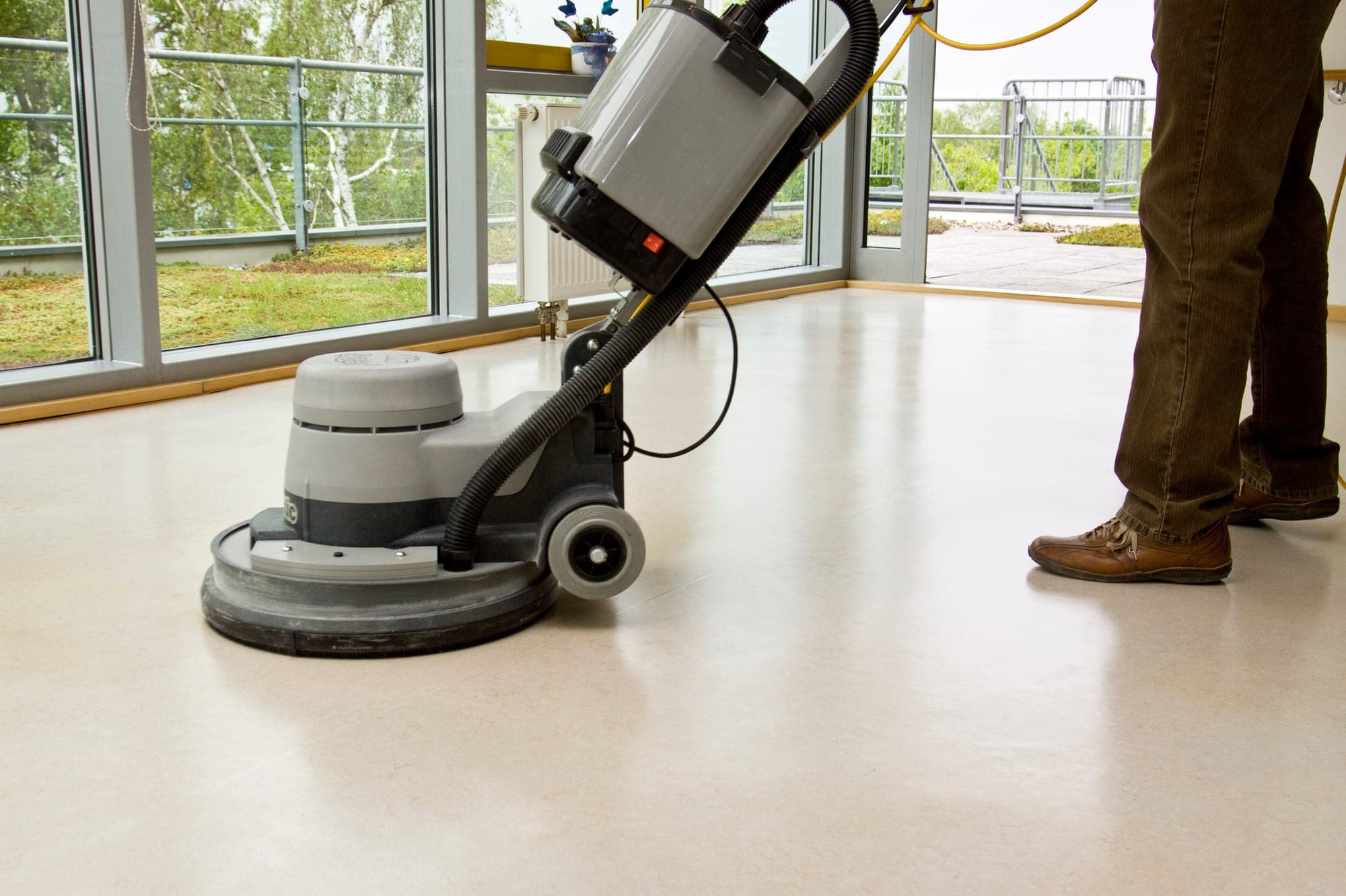 Polishing a commercial floor to a glossy finish in Spokane